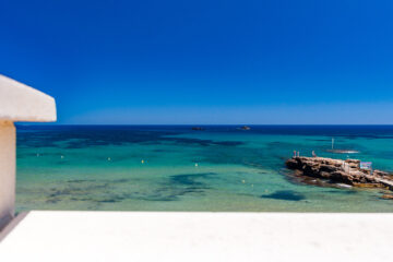 Mauer mit Meer  Platja es Figueral Balearische Inseln - Ibiza Spanien by Peter Ehlert in Ibiza - Insel des Lichts